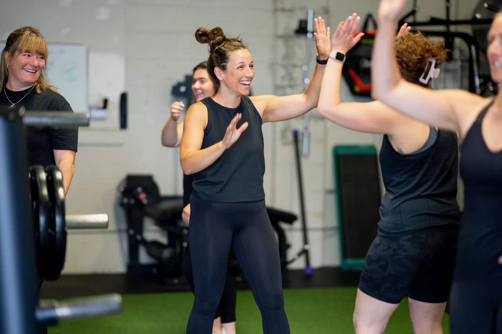 The KLT Fit community celebrating together after a session