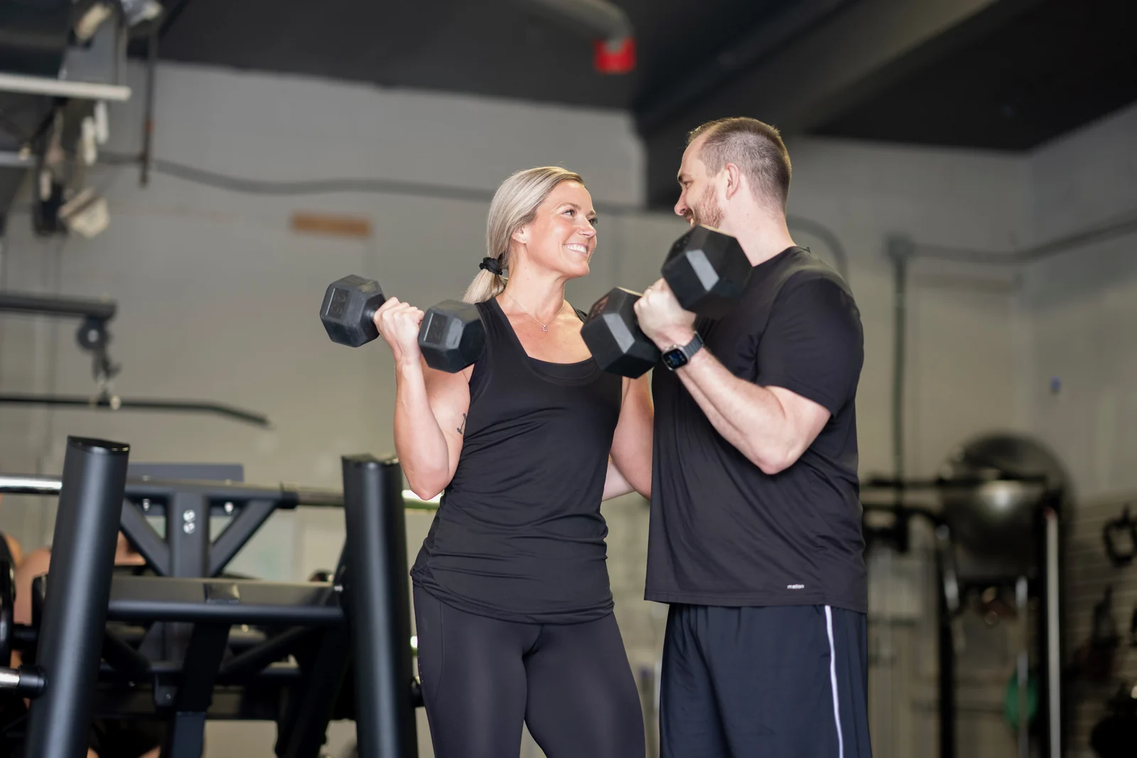 Kate and Josh, hosts of the KLT Fitcast, training together in the studio