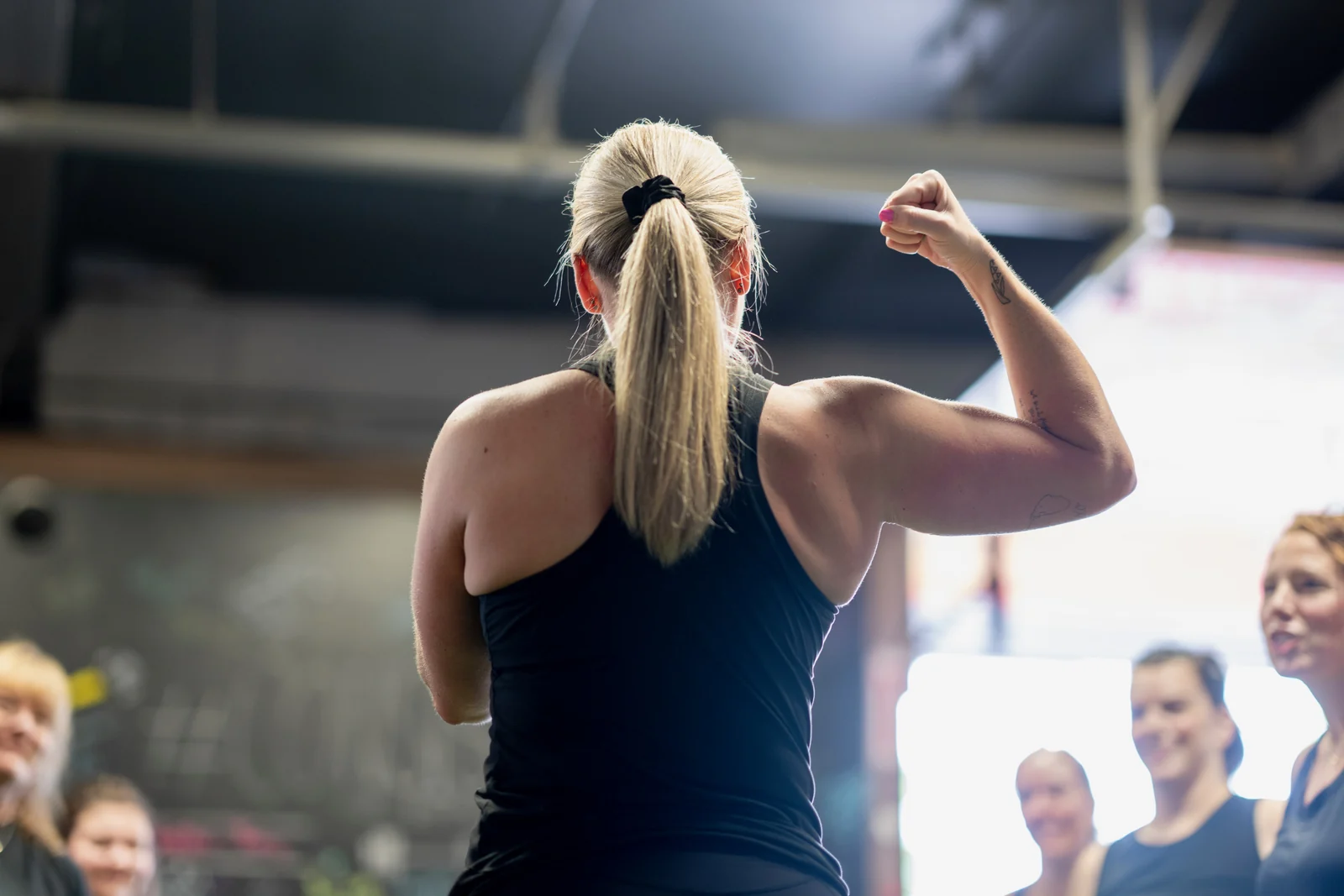 A KLT Fit member flexing after a heavy lift in the Peterborough studio